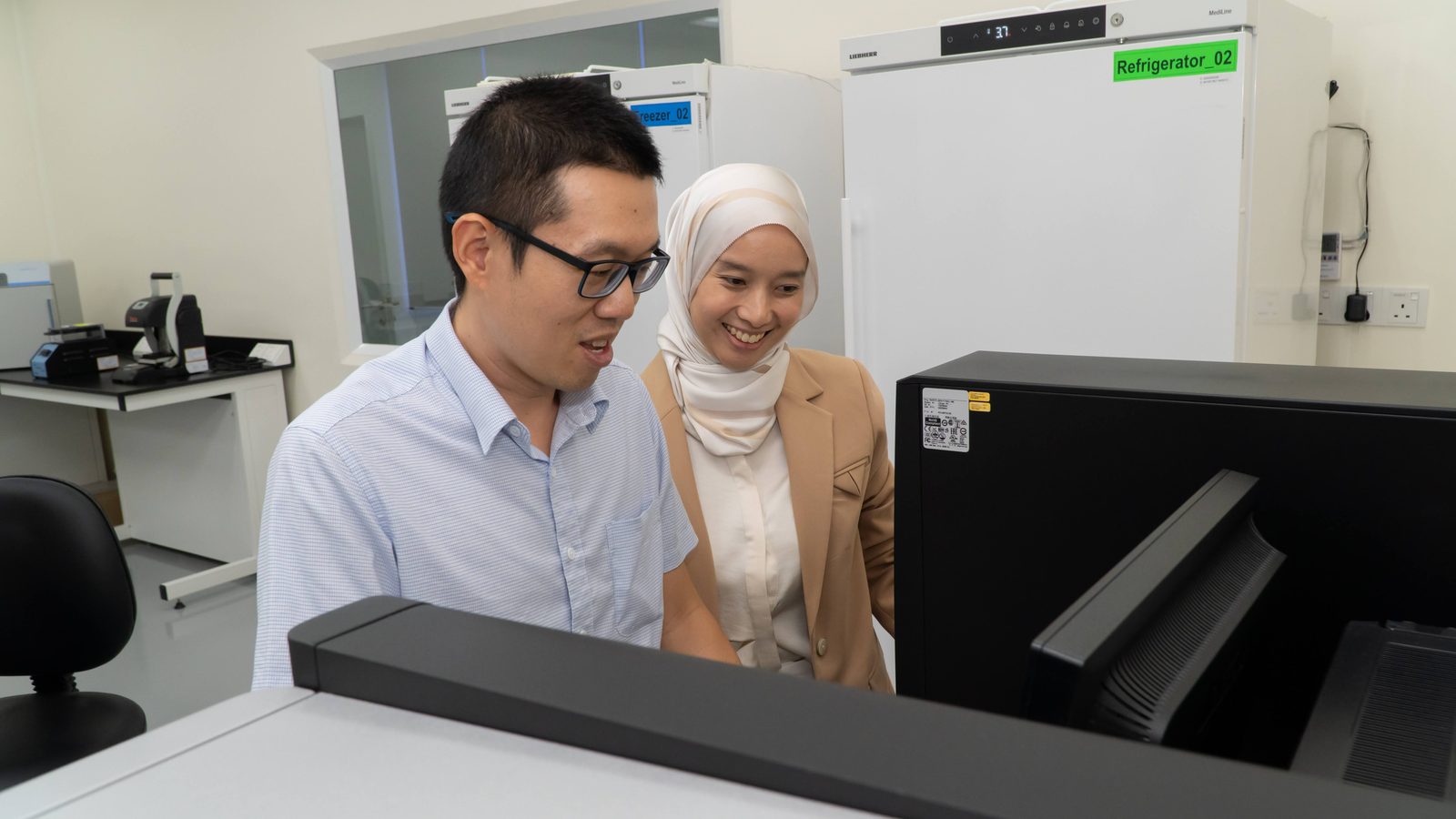 Neo Nexon scientists reviewing genomic data on screen